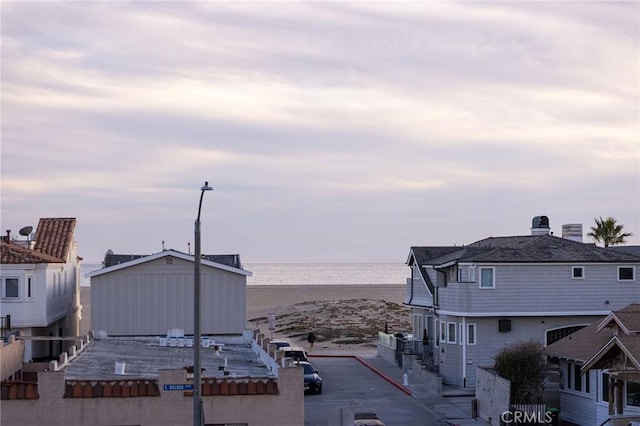 exterior space with a water view