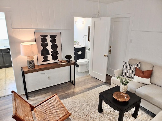 living area featuring light wood finished floors