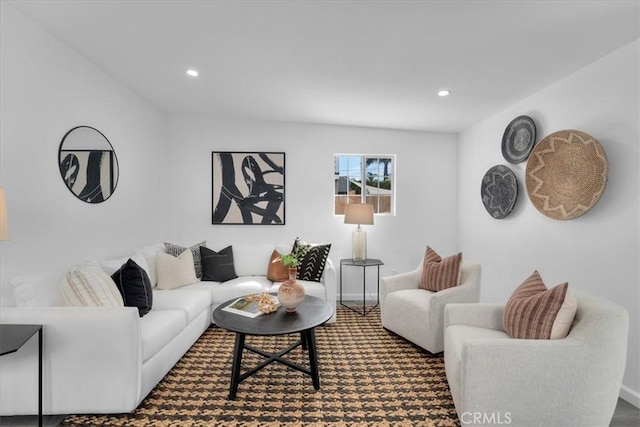 living room featuring carpet and recessed lighting