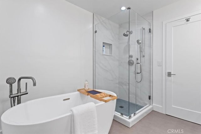 1409 Havenhurst Dr Unit 3, West Hollywood, CA 90046 - bathroom featuring a stall shower and a freestanding bath