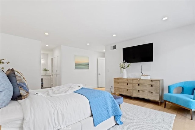 1409 Havenhurst Dr Unit 3, West Hollywood, CA 90046 - bedroom with light wood finished floors, visible vents, recessed lighting, and ensuite bath