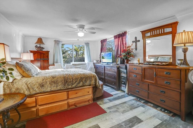 bedroom featuring ceiling fan and light wood-type flooring