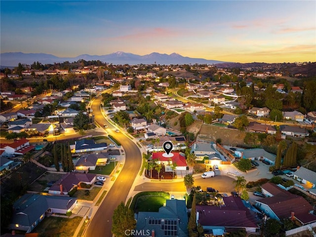 birds eye view of property featuring a residential view and a mountain view