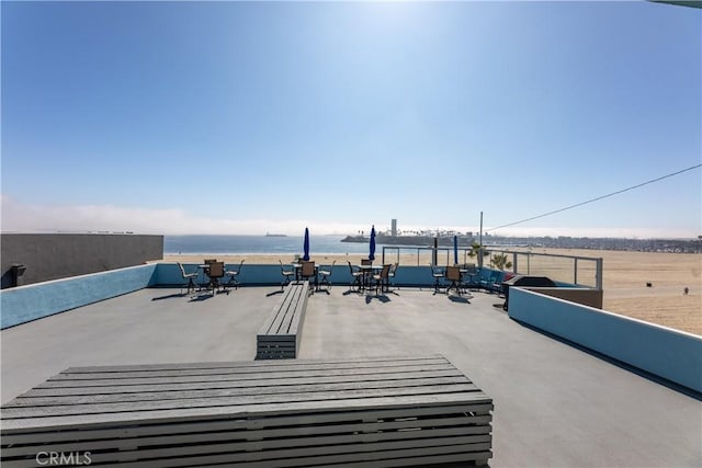 view of patio / terrace with a water view