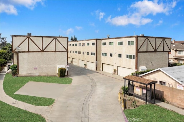 11331 Elliott Ave Unit 21, El Monte, CA 91732 - view of property with concrete driveway