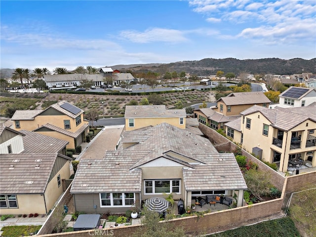 bird's eye view with a residential view and a mountain view