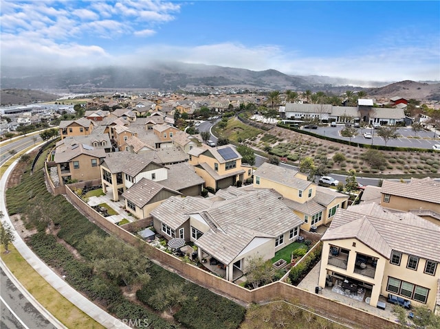 aerial view with a mountain view and a residential view