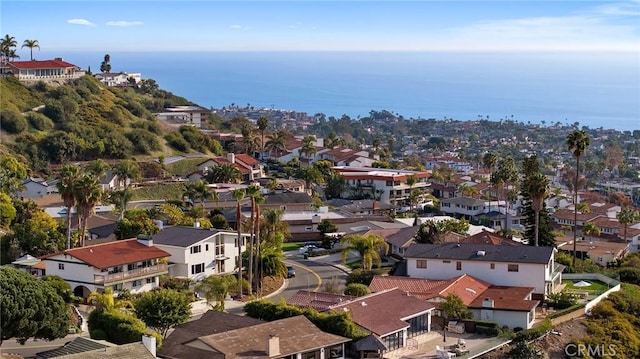 bird's eye view with a water view and a residential view