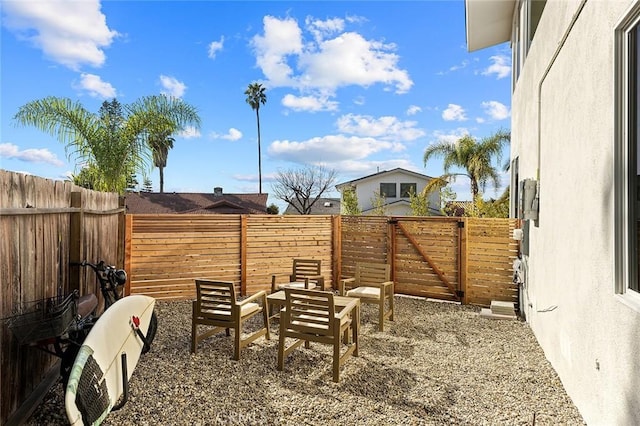 view of yard with an outdoor hangout area, a patio area, and a fenced backyard