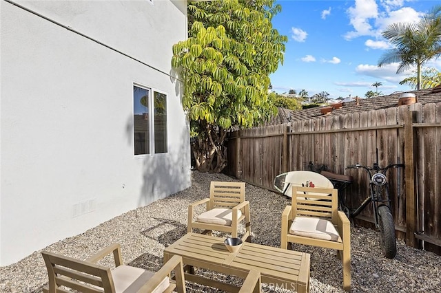 view of patio with fence