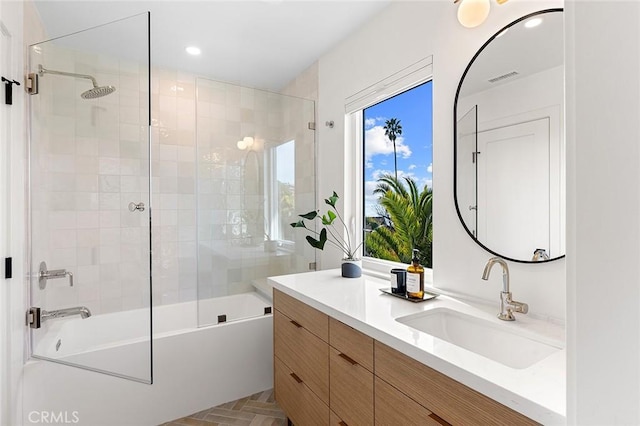 full bathroom featuring visible vents, shower / bath combination, vanity, and recessed lighting