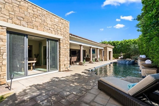 outdoor pool with a patio