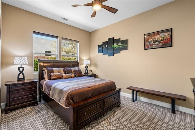 bedroom featuring baseboards, visible vents, ceiling fan, and carpet flooring