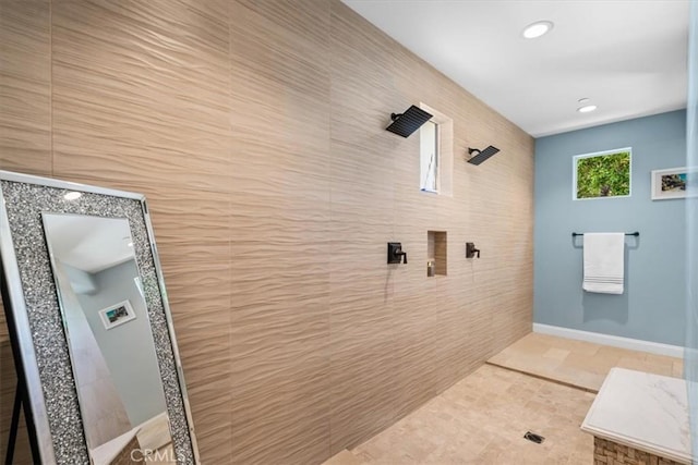 full bath featuring recessed lighting, tiled shower, and tile patterned floors