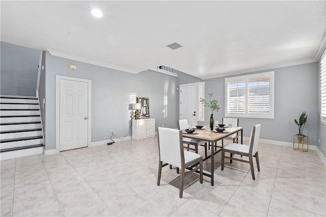 dining space with ornamental molding, visible vents, baseboards, and stairs