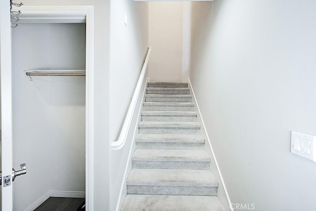 stairway with baseboards