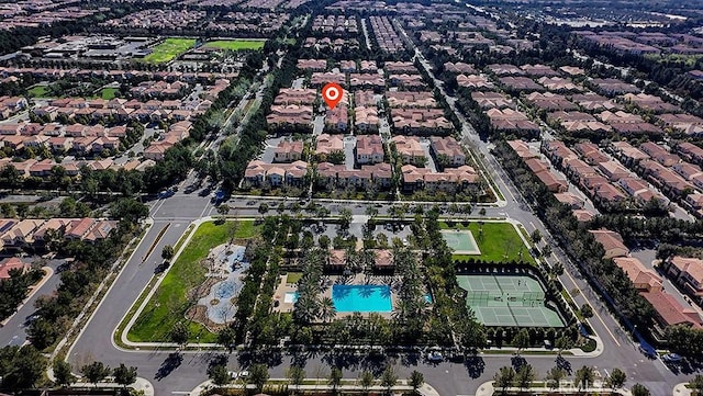 birds eye view of property with a residential view