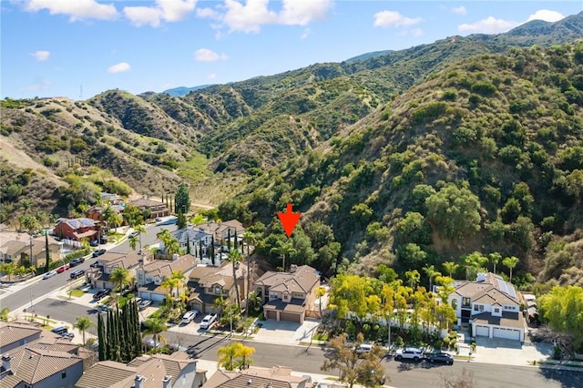 bird's eye view featuring a residential view and a mountain view