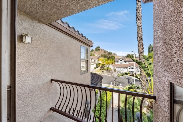 balcony featuring a residential view