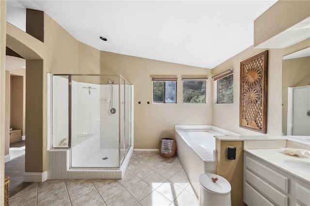 full bath featuring lofted ceiling, a stall shower, a garden tub, and tile patterned floors