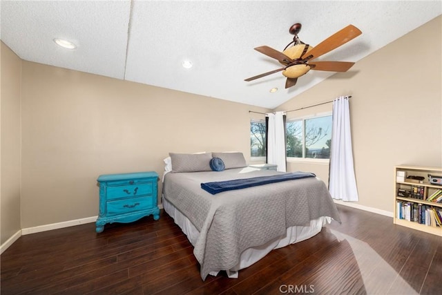 bedroom with baseboards, lofted ceiling, ceiling fan, dark wood-type flooring, and recessed lighting