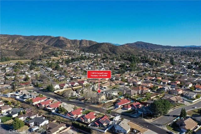 bird's eye view with a residential view and a mountain view