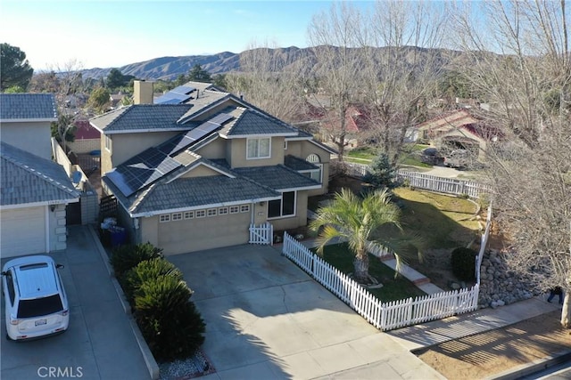 drone / aerial view featuring a mountain view