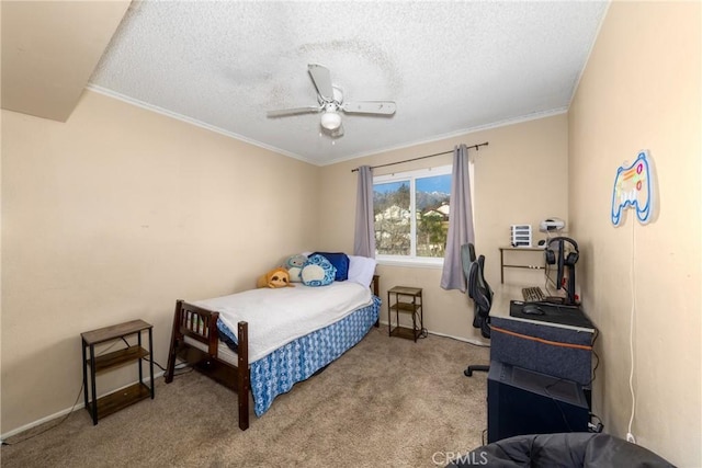 bedroom with light carpet, baseboards, ceiling fan, crown molding, and a textured ceiling