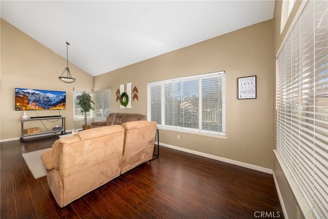 living room with high vaulted ceiling, baseboards, and dark wood-style flooring