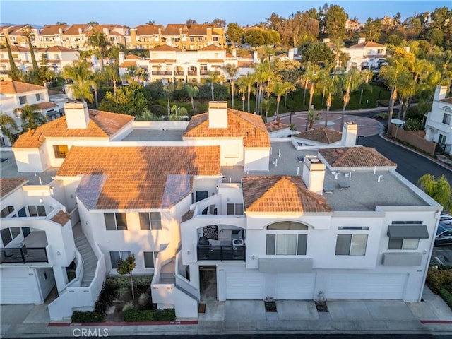 birds eye view of property with a residential view