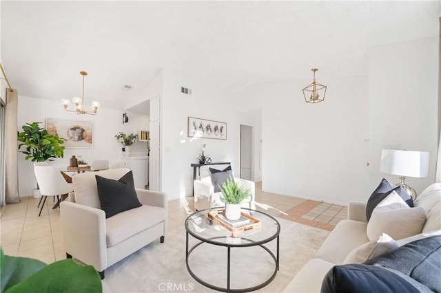 living room featuring lofted ceiling, visible vents, a notable chandelier, and light tile patterned floors