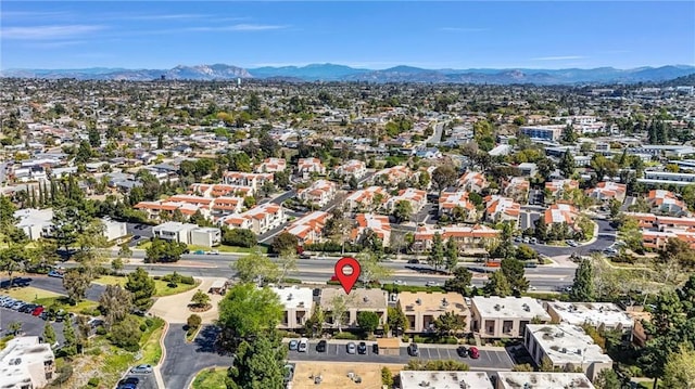 aerial view with a mountain view and a residential view