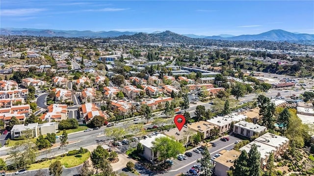 drone / aerial view featuring a mountain view