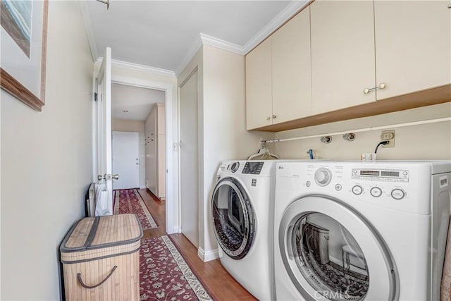 2222 Cielo Pl, Arcadia, CA 91006 - laundry room with separate washer and dryer, light wood finished floors, cabinet space, and crown molding