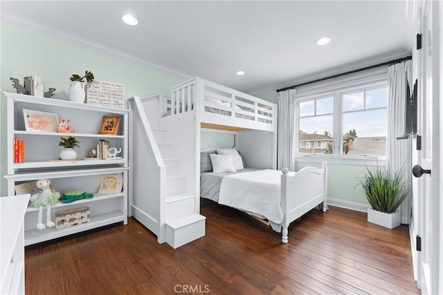 bedroom featuring ornamental molding, recessed lighting, baseboards, and wood finished floors