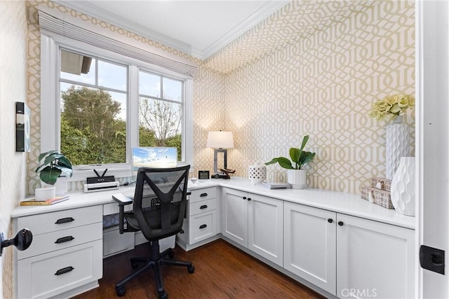 office area with wallpapered walls, dark wood-type flooring, and crown molding