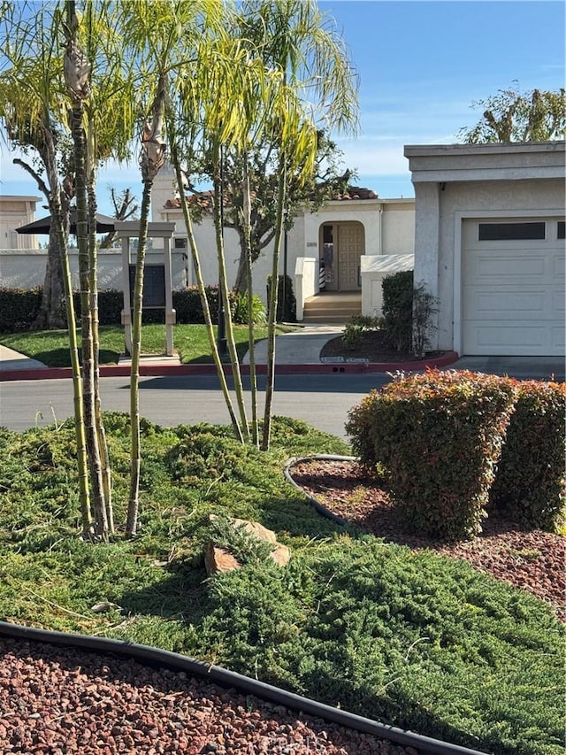 view of yard with a garage