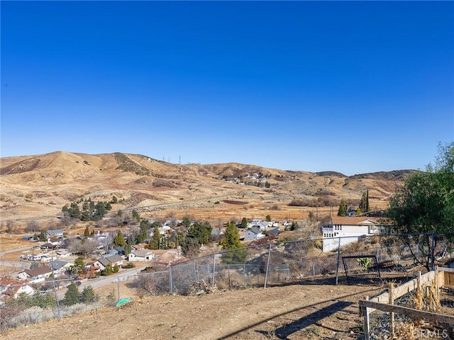 property view of mountains with a residential view