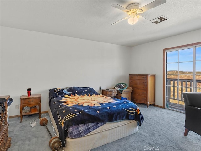 bedroom featuring light colored carpet, a ceiling fan, baseboards, visible vents, and access to outside