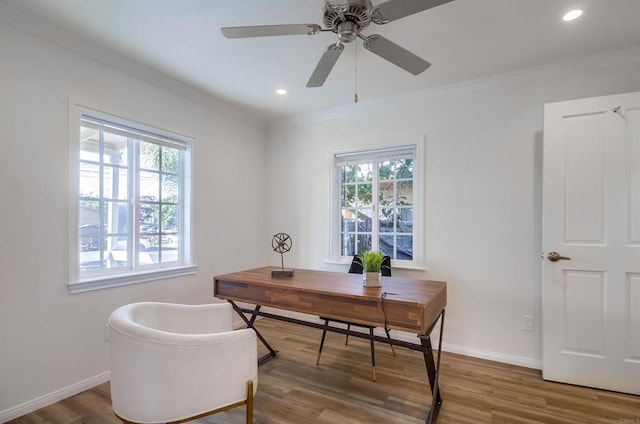 home office featuring baseboards, wood finished floors, and crown molding