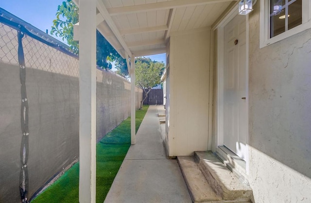 exterior space with fence and stucco siding