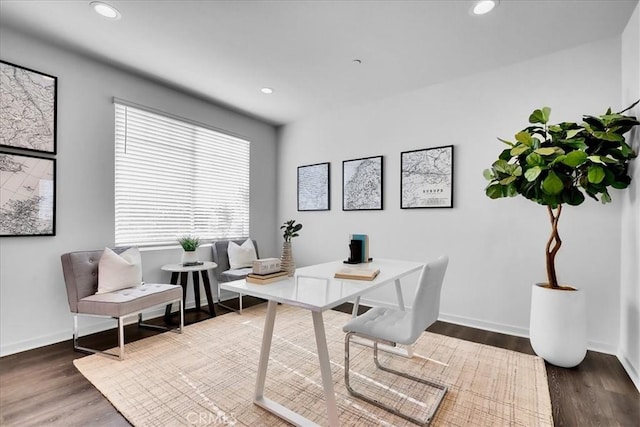 office space featuring baseboards, dark wood finished floors, and recessed lighting