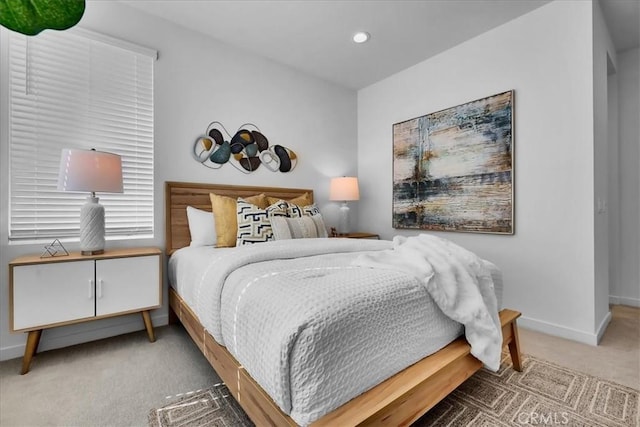 carpeted bedroom with recessed lighting and baseboards