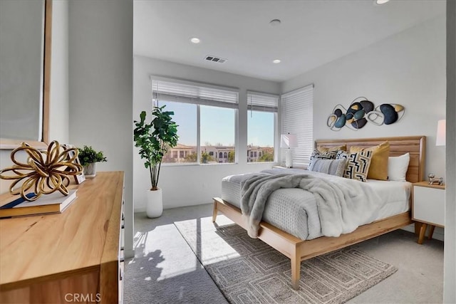 bedroom with recessed lighting, visible vents, and carpet flooring