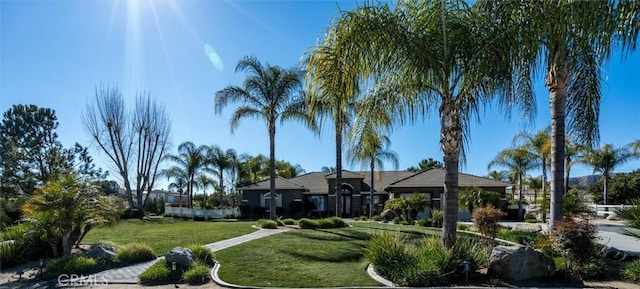 view of front of home with a front lawn