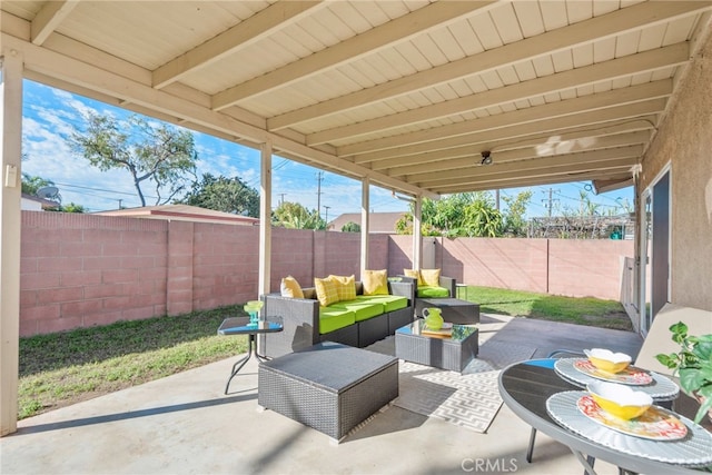 view of patio with a fenced backyard and an outdoor hangout area