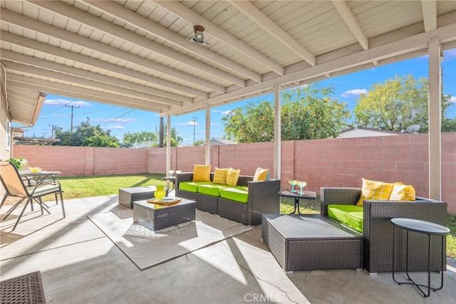 view of patio / terrace featuring a fenced backyard and an outdoor living space