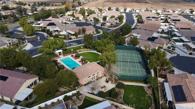 birds eye view of property with a residential view