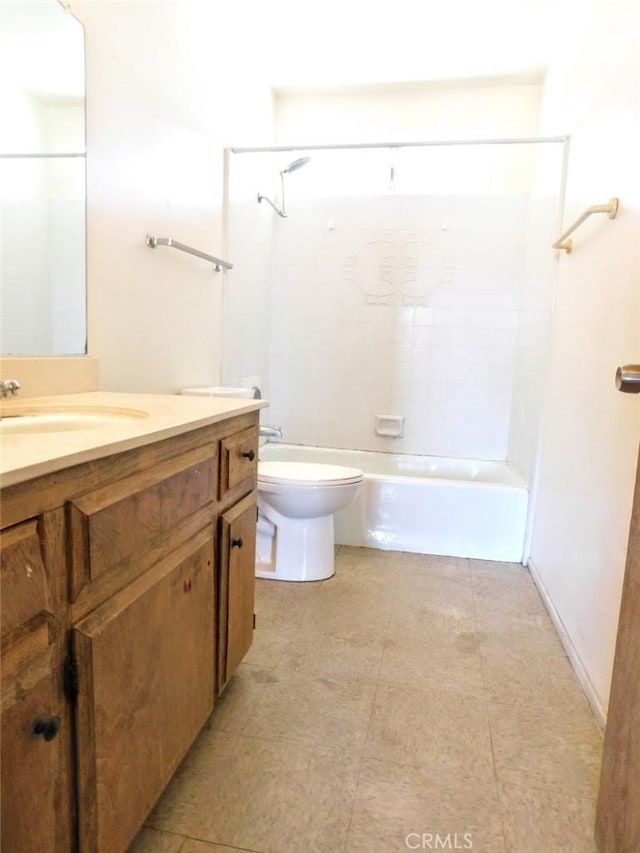 bathroom featuring toilet, bathtub / shower combination, and vanity