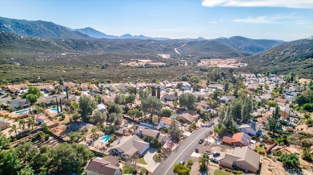 birds eye view of property with a residential view and a mountain view